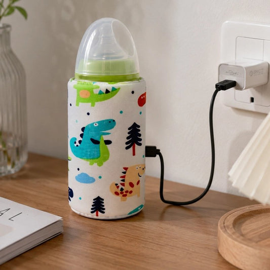 Chauffe biberon nomade dinosaure,  branché sur la table